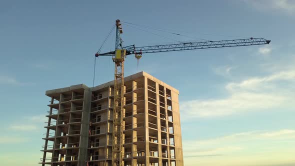 Aerial View of Concrete Frame of Tall Apartment Building Under Construction in a City