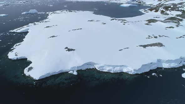 Antarctica Snow Covered Peninsula Aerial Top View