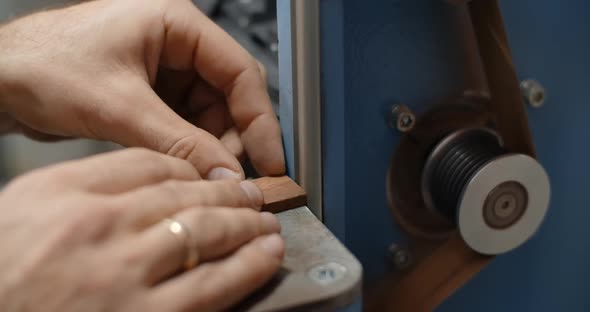 Carpenter Uses Belt Sander at His Workshop for Processing the Small Timber Items  60p 10 Bit