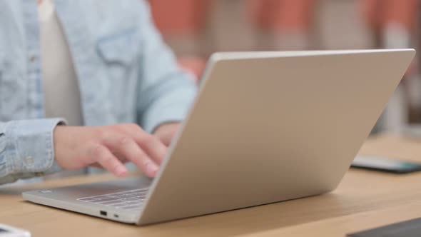 Male Hands Typing on Laptop Close Up