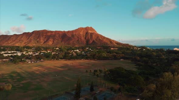 Aerial drone footage of Honolulu, Hawaii. Beautiful real estate, buildings in the city. Palm trees