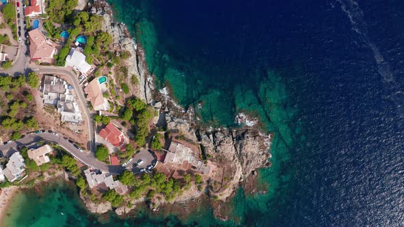 Drone Over Coastline And Buildings Of Cap De Creus