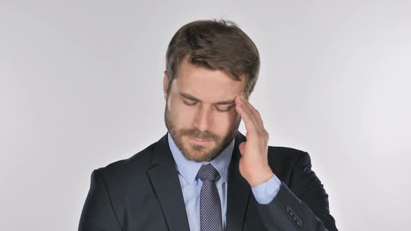 Portrait of Businessman Gesturing Headache Stress