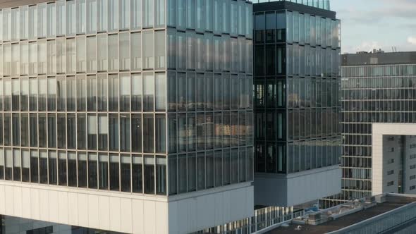 AERIAL: Cologne Futuristic Kranhaus, Crane House Apartments, Office Buildings in Beautiful Sunlight