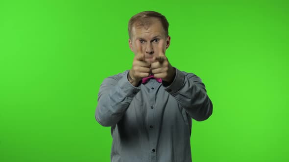 Man Pointing Finger Gun Gesture, Shooting with Hand Pistol. Sale, Black Friday, Discounts Concept