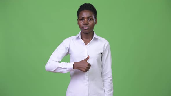 Young Beautiful African Businesswoman Giving Thumbs Up