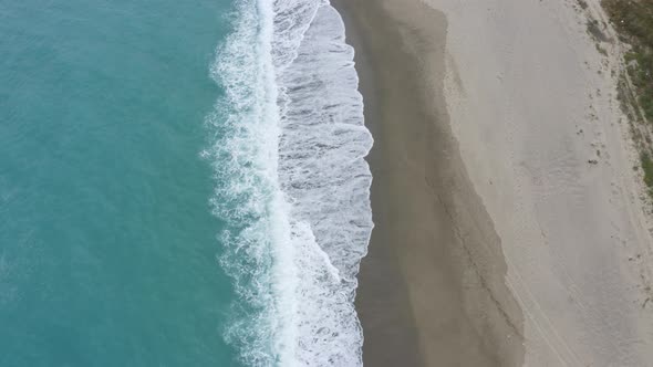 Vertical of Beach and Stormy Ocean