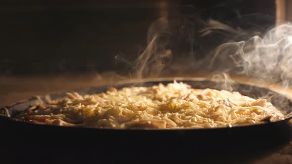 Tasty Four Cheese Pizza Is Baking in Electric Oven at Kitchen Restaurant