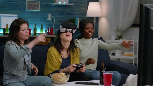 Black Woman Experiencing Virtual Reality Headset Winning Video Games
