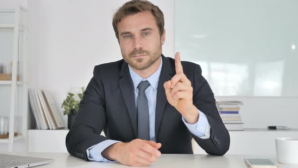 No, Businessman Rejecting Offer By Waving Finger
