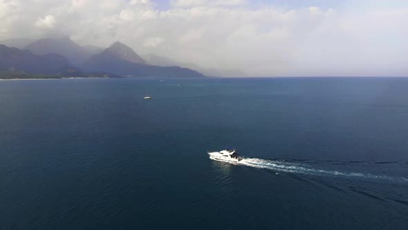 Luxury white speed boat floating in open sea