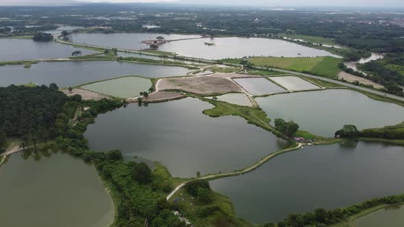 Aerial view abandoned tin mining lake