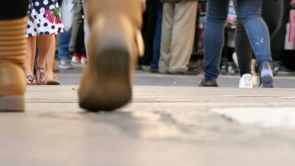 Crowded Tourists Feet in Las Ramblas Street