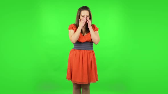 Cute Girl Is Tired and Sighs. Green Screen