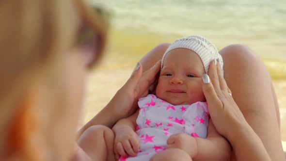  - Mom and Baby Spending Outing at the Beach