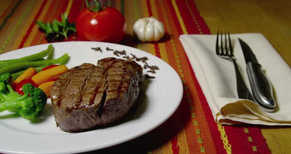 Filet Mignon And Vegetables On White Plate 