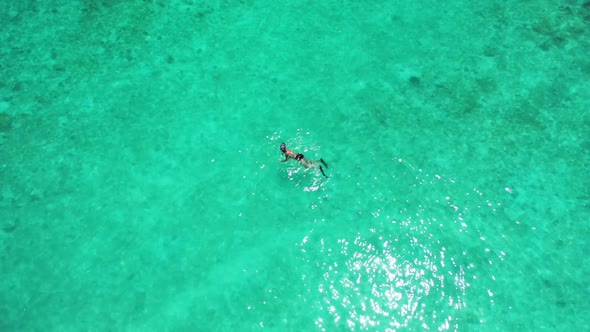 Romantic couple tan on luxury lagoon beach adventure by blue sea with white sand background of the M