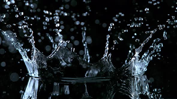 Super Slow Motion Shot of Water Crown Splash at 1000Fps Isolated on Black Background