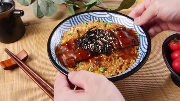 Unagi fish rice bowl serving - Japanese food cuisine
