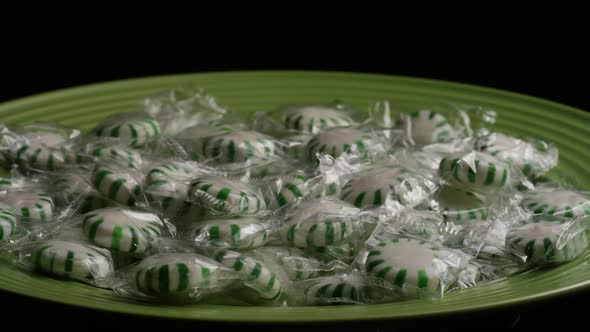 Rotating shot of spearmint hard candies 