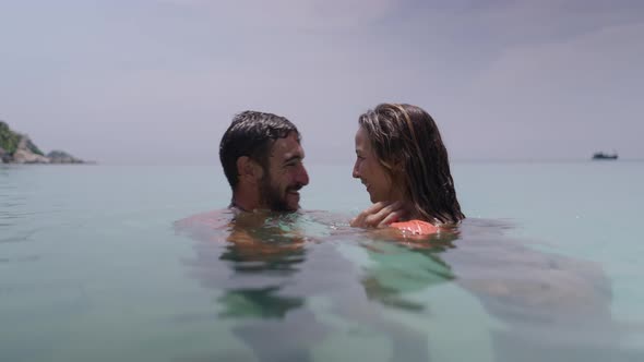 A Close Up Shot of a Romantic People Loving Each Other In the Swimming Pool Water Enjoying Beautiful