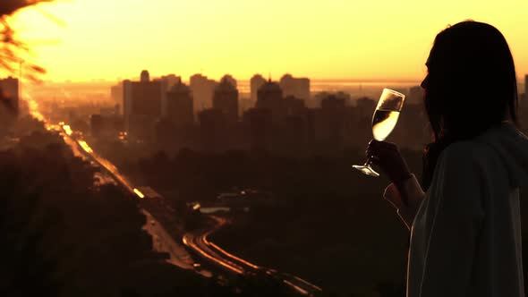 Female Drinking Wine Outdoors