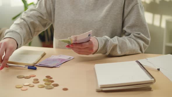 Housewife Counting Money for Monthly Expenses Rich Woman Holding a Stack of Euro in Hands