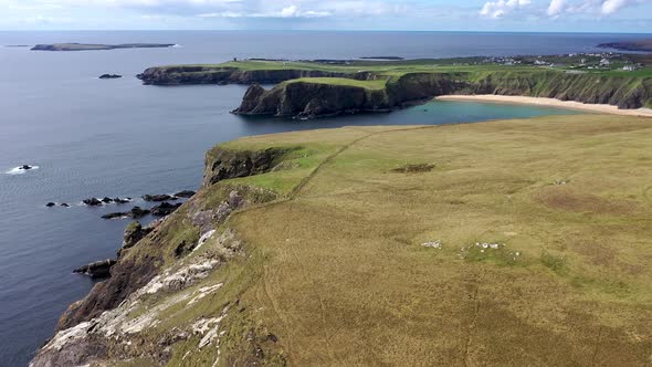 Aerial View of the Beautiful Coast at Malin Beg with Slieve League in the Background in County