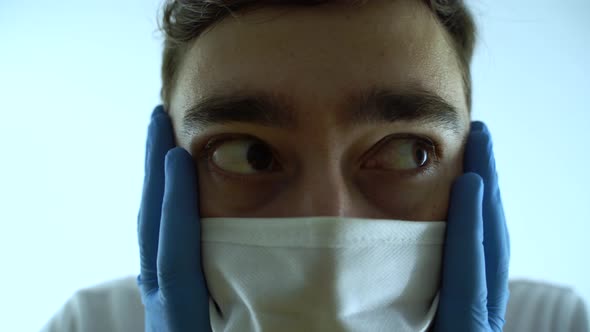 Close Up Shocked Man with Mask on Face