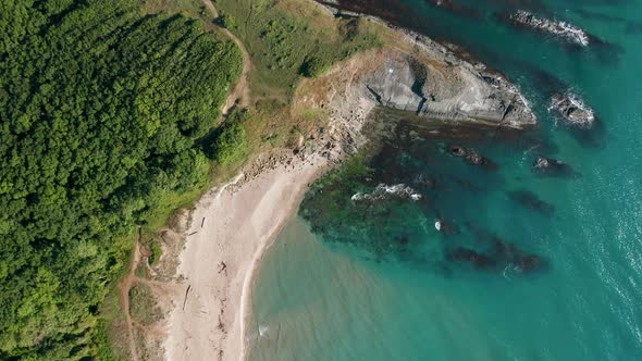 Drone flight above a picturesque rocky coastline