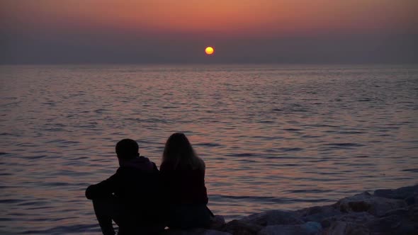 Ocean Sunset And Couple