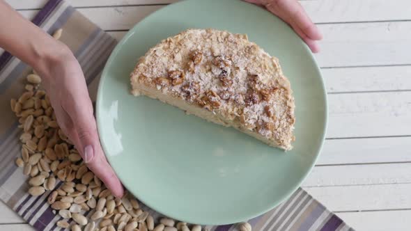 Cake with Nuts on a Light Background