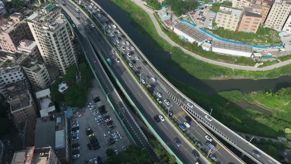 Aerial footage of Morning rush hour of traffic to enter the town in shenzhen city, China. Hypelapse