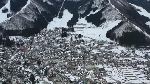 dense populated mountain ski resort village nozawa onsen in japan during winter