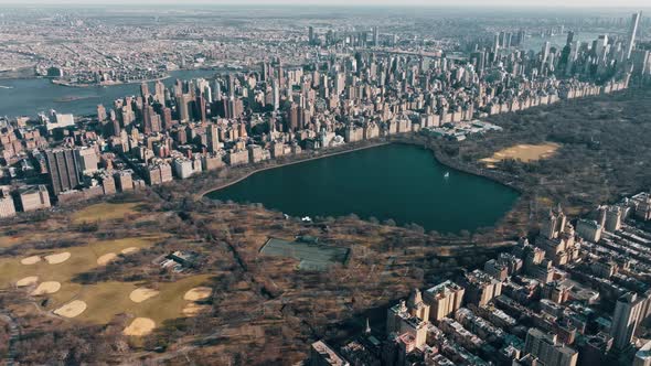 Aerial Drone Flight Above Green Central Park in Manhattan