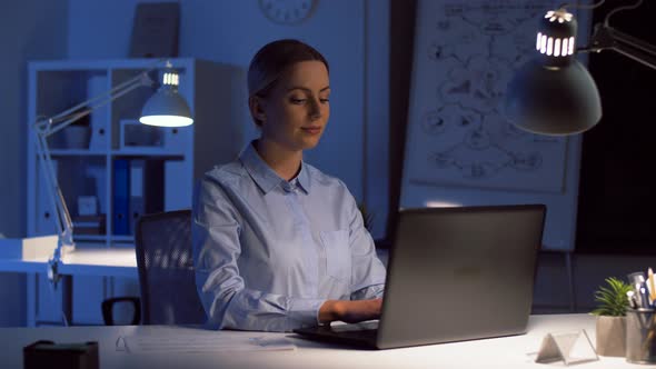 Businesswoman with Laptop Working at Night Office 88