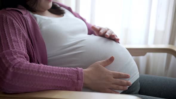 Pregnant Couple Feels Love and Relax at Home