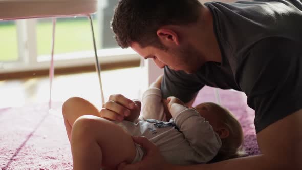 Toddler With Father at Home