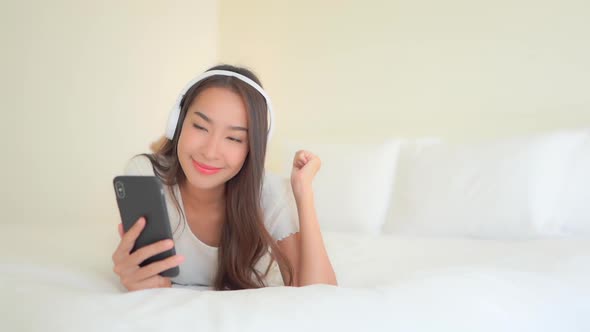 Woman use smart phone for listen music