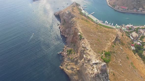 Drone View of the Steep Cliffs and the Remains of a Destroyed Fortress