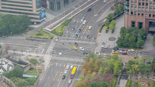 Time Lapse of very busy traffic passing at Intersection at Taipei City Taiwan.