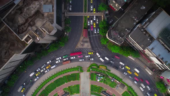 4K Time lapse aerial top view from a drone, traffic on a roundabout road in Thailand