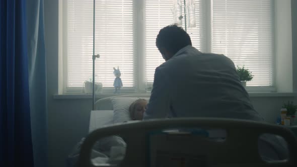 Doctor Doing Medical Examination of Sick Child Modern Pediatric Hospital Ward