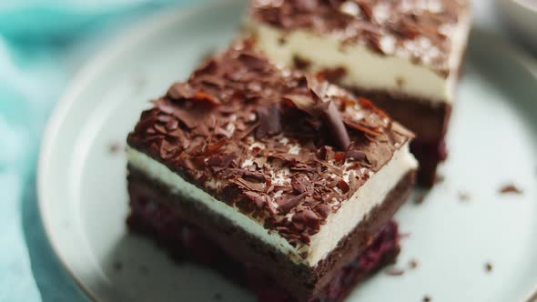 Delicious Chocolate Cake with Layers Served on Ceramic Blue Plate