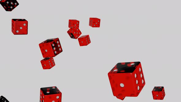 Red dice falling down on white background.