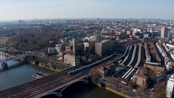 Cinematic circling aerial Drone shot of Grosvenor road and railway bridge London