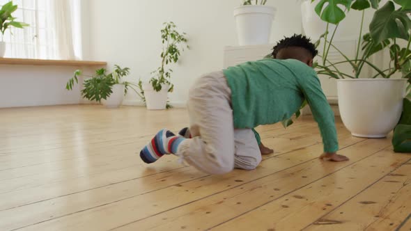 Young boy playing at home