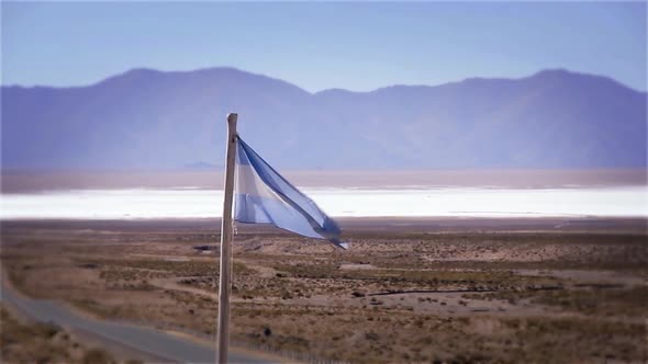 Argentine Flag in Salinas Grandes Salt Flat, Jujuy Province, Argentina.