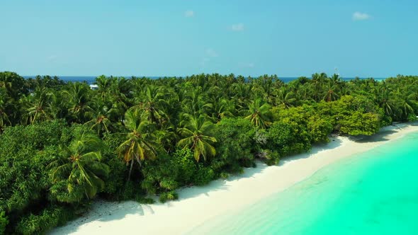 Aerial view texture of tropical coastline beach lifestyle by turquoise lagoon with white sandy backg