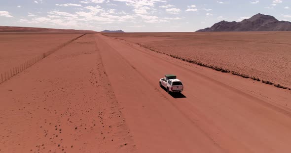 Off-road driving in Namibia. Kalahari Desert with Aerial Drone 4